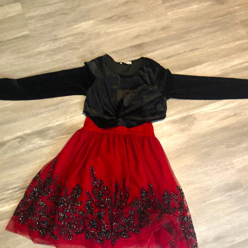 Red dress with black cover.